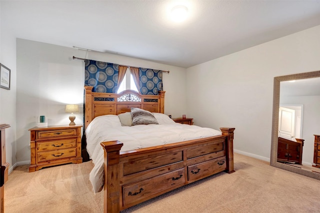 bedroom with light carpet