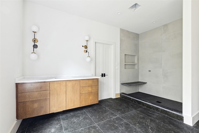 bathroom featuring walk in shower