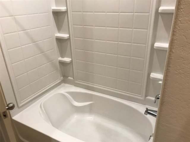 bathroom with shower / bathing tub combination