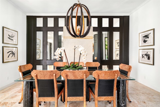 dining room featuring ornamental molding and an inviting chandelier