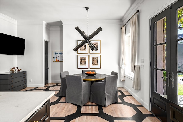 dining area featuring plenty of natural light and light wood-type flooring