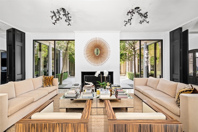 living room featuring ornamental molding and a wealth of natural light