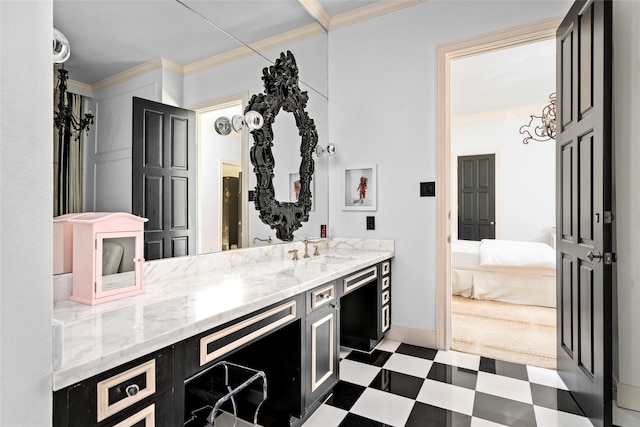 interior space with light stone counters, sink, and ornamental molding