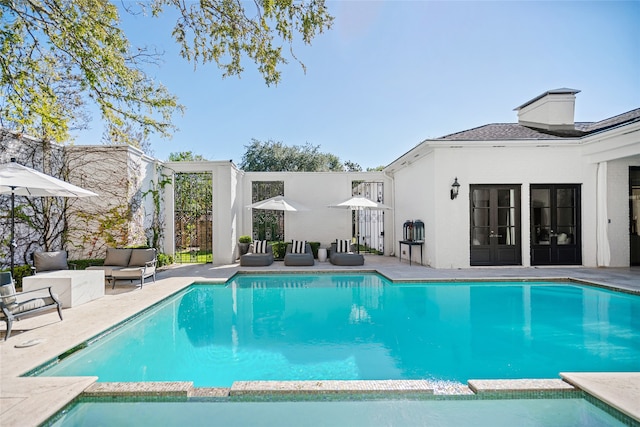 view of pool featuring a patio area