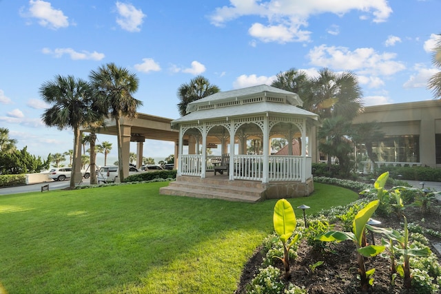 view of community with a lawn and a gazebo