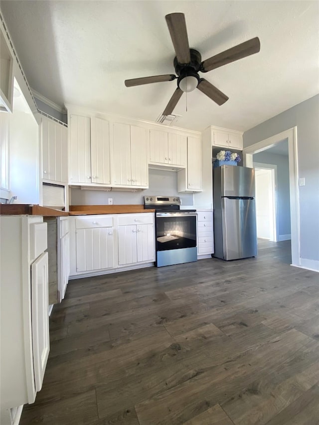 kitchen featuring ceiling fan, white cabinets, dark wood-type flooring, and appliances with stainless steel finishes