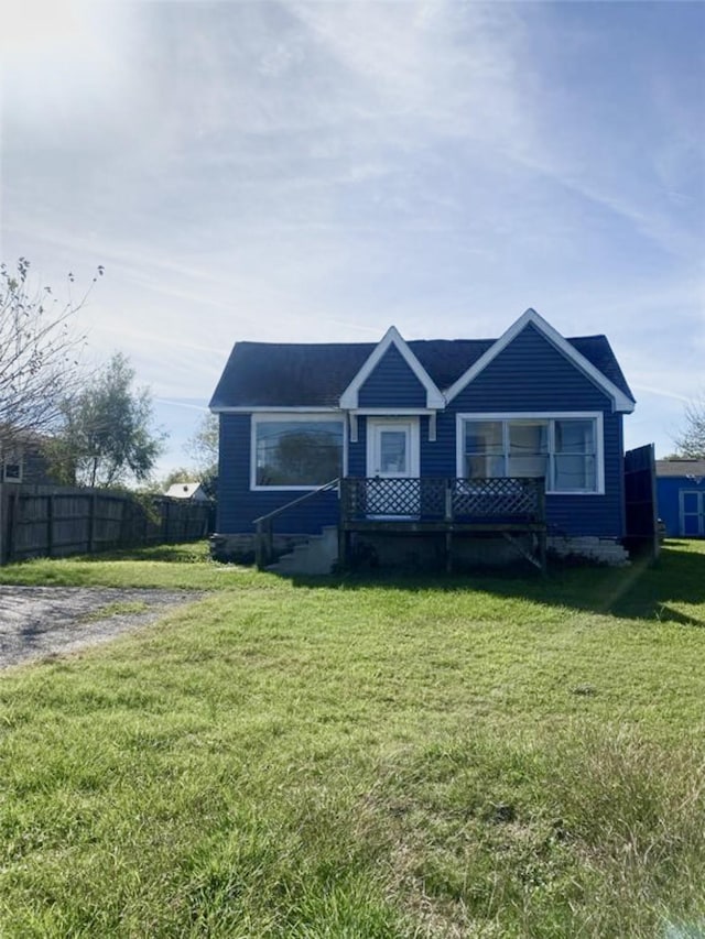 view of front of home with a front yard