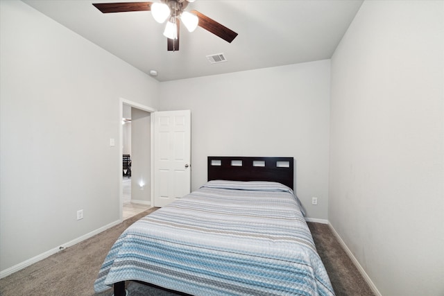 bedroom featuring ceiling fan and carpet floors