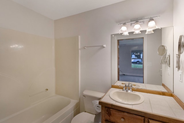 full bathroom with vanity, toilet, and shower / washtub combination