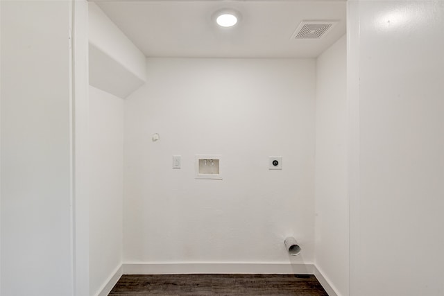 clothes washing area with hookup for an electric dryer, washer hookup, dark hardwood / wood-style floors, and gas dryer hookup