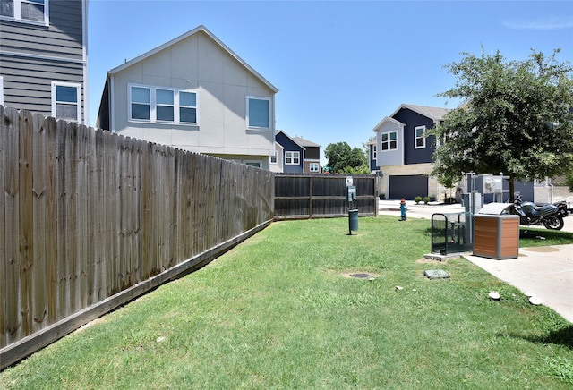 view of yard featuring a garage