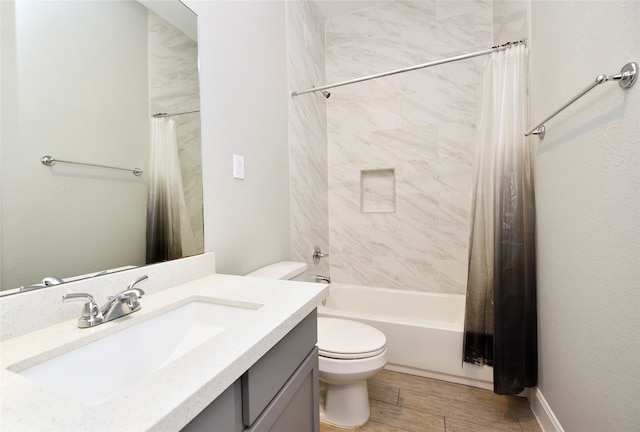 full bathroom featuring vanity, toilet, shower / bath combo with shower curtain, and wood-type flooring