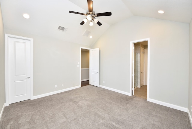 unfurnished bedroom featuring ceiling fan, lofted ceiling, and light carpet