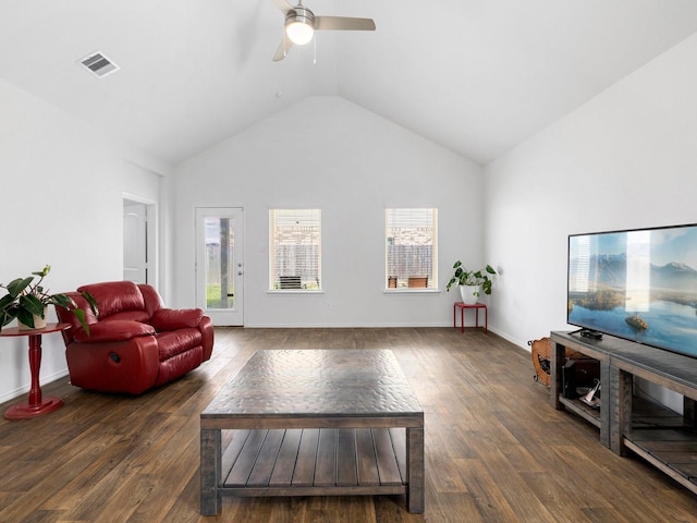 living room featuring dark hardwood / wood-style floors, high vaulted ceiling, and ceiling fan