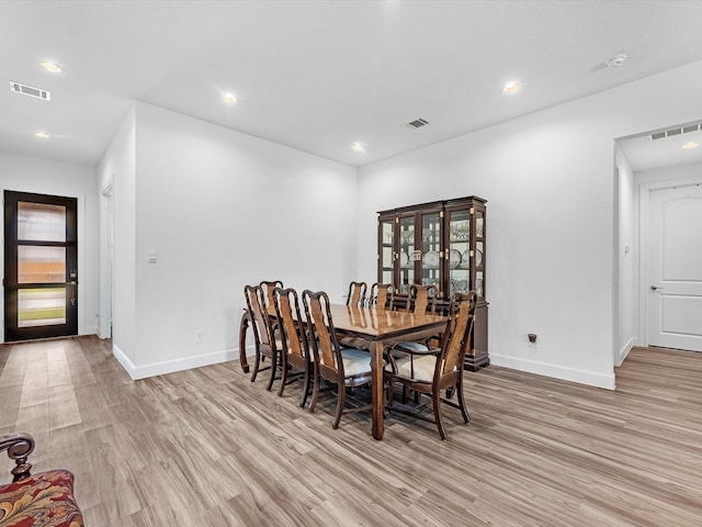 dining room featuring light hardwood / wood-style floors