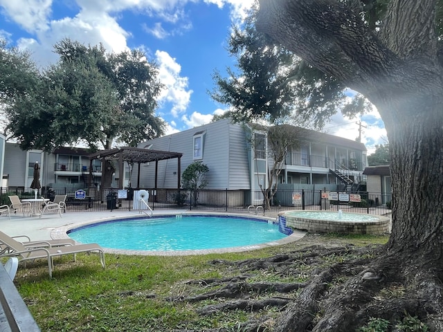 view of pool with a pergola and a patio area