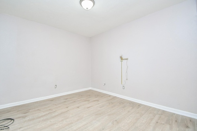 unfurnished room featuring light wood-type flooring