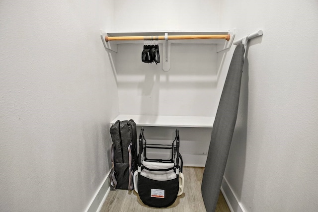 spacious closet featuring light hardwood / wood-style flooring