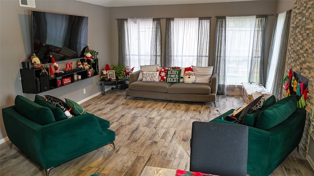 living room featuring hardwood / wood-style floors and plenty of natural light