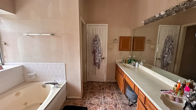 bathroom featuring vanity and a bathtub