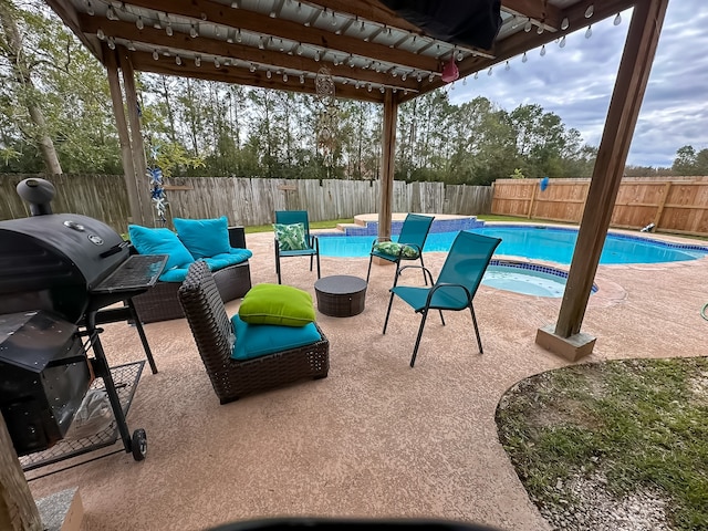 view of pool featuring a patio area, a grill, an outdoor hangout area, and a hot tub