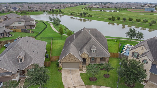 bird's eye view with a water view