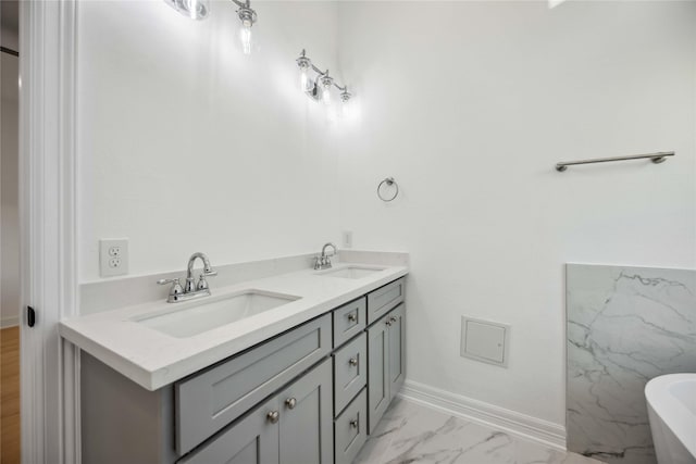 bathroom featuring a bathing tub and vanity