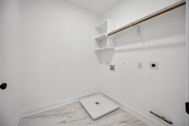 laundry room featuring marble finish floor, hookup for a washing machine, gas dryer hookup, electric dryer hookup, and laundry area