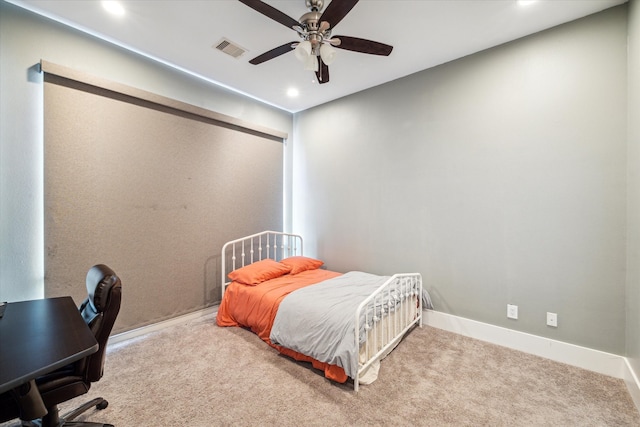 carpeted bedroom with ceiling fan