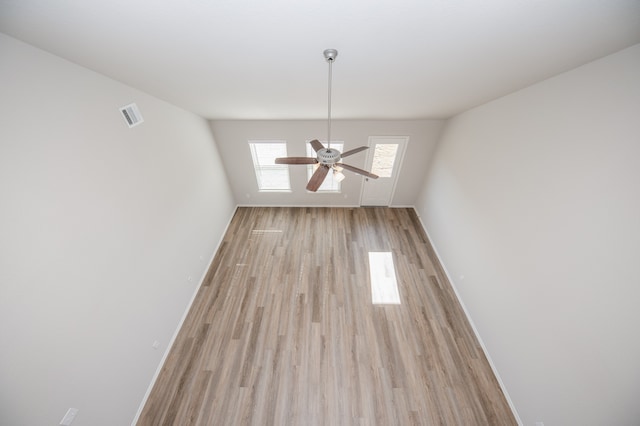 interior space featuring ceiling fan and light hardwood / wood-style flooring