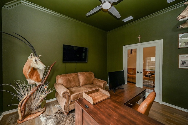 living room with hardwood / wood-style flooring, french doors, ceiling fan, and ornamental molding