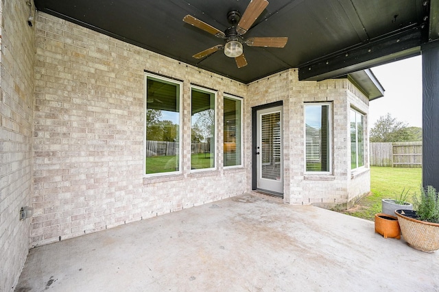 view of patio / terrace featuring ceiling fan