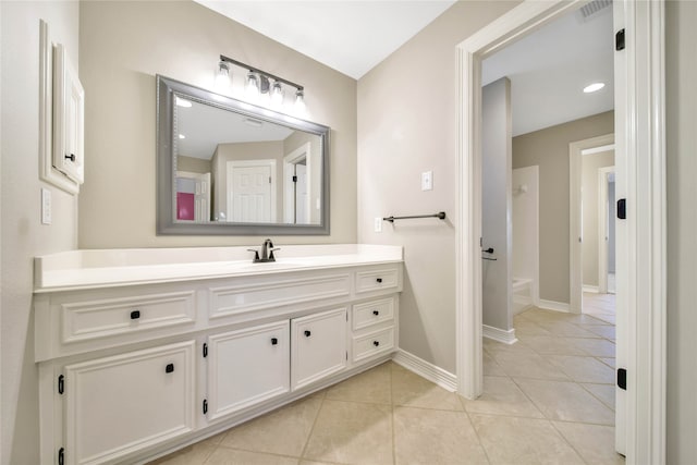 bathroom with vanity and tile patterned floors