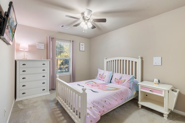 carpeted bedroom featuring ceiling fan