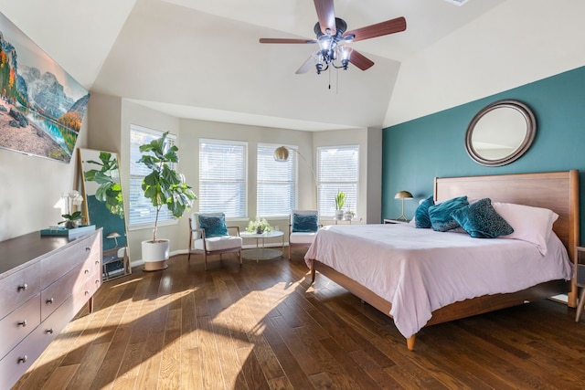 bedroom featuring vaulted ceiling, dark wood-type flooring, and ceiling fan