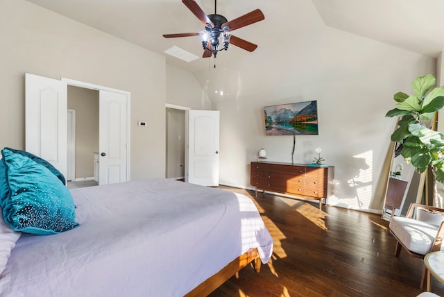 bedroom featuring ceiling fan, vaulted ceiling, and wood-type flooring