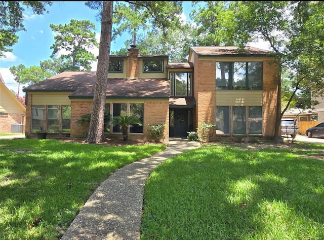 view of front facade with a front yard