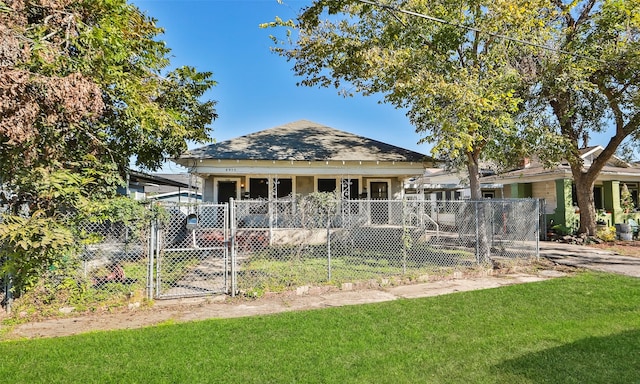 bungalow-style home featuring a front yard and a porch