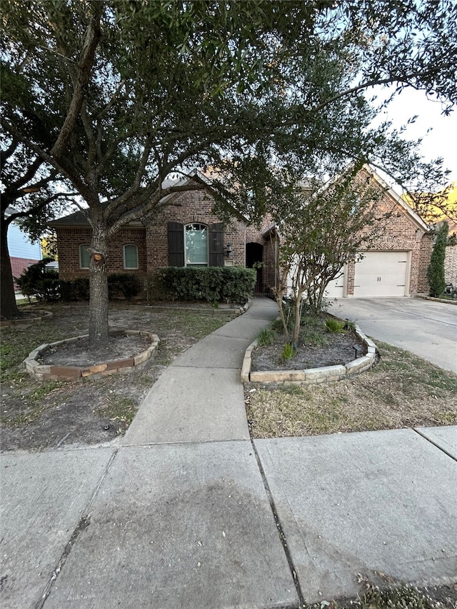 single story home featuring a garage