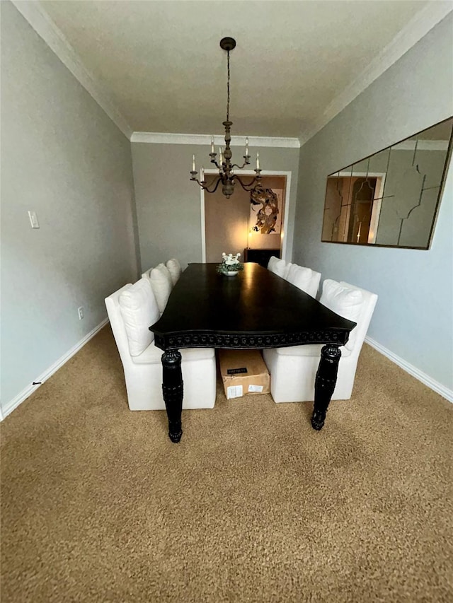 dining room with carpet floors, ornamental molding, and an inviting chandelier