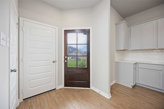 doorway featuring light hardwood / wood-style flooring