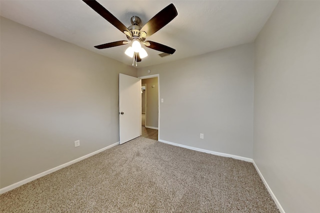 unfurnished room featuring carpet flooring and ceiling fan