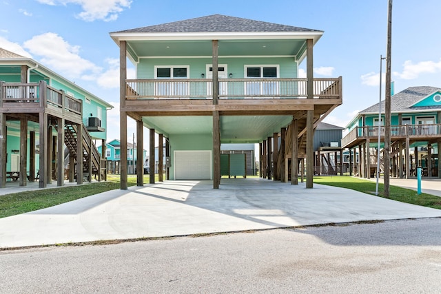 raised beach house with a carport