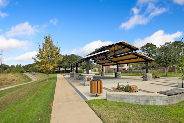 view of home's community with a gazebo and a lawn