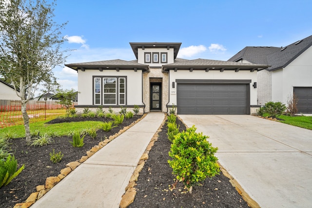 view of front of property featuring a garage