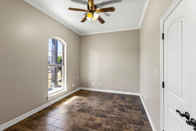 spare room featuring ceiling fan and ornamental molding