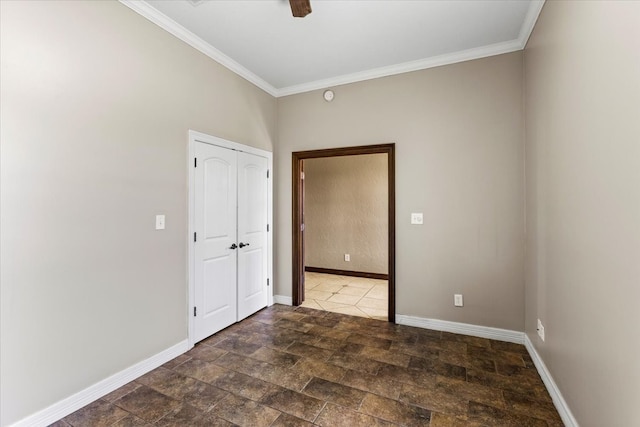 spare room featuring crown molding