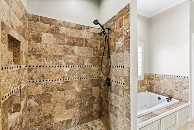 bathroom with shower with separate bathtub and ornamental molding