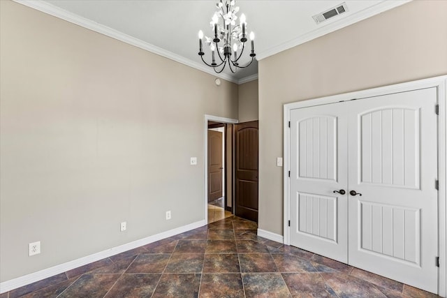 unfurnished bedroom featuring crown molding and an inviting chandelier