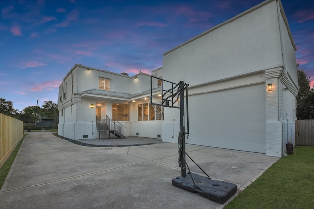 view of front of home with a garage